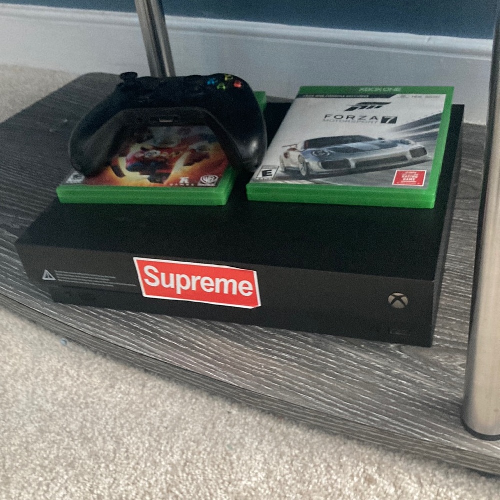 Xbox one X with forza Motorsport 7 and the incredibles